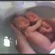 Image for article titled Twin Babies Awesomely Recreate Life Inside the Womb During a Bath